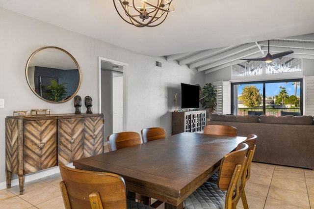 dining room featuring lofted ceiling with beams, light tile patterned flooring, and ceiling fan with notable chandelier