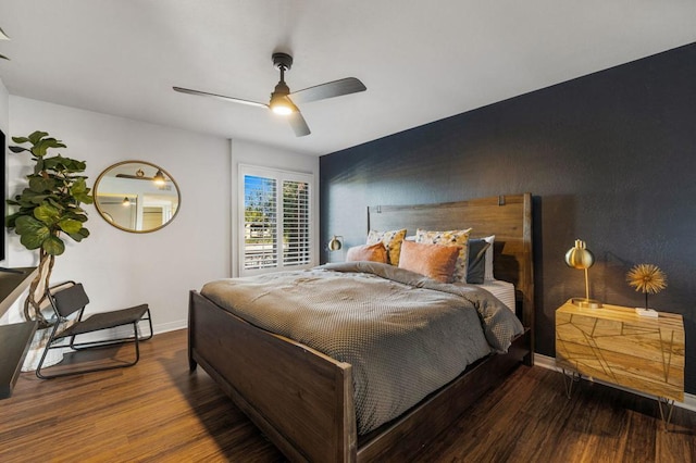 bedroom featuring hardwood / wood-style floors and ceiling fan