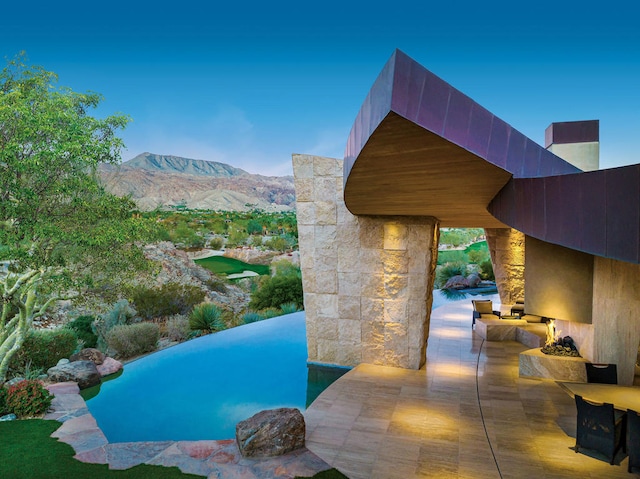 view of pool with a mountain view