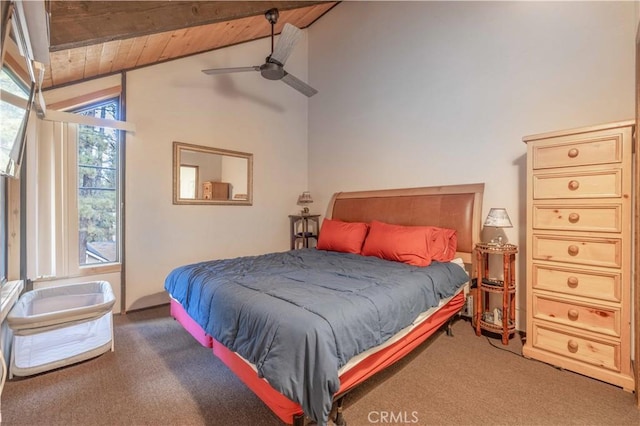 carpeted bedroom with ceiling fan, wood ceiling, and vaulted ceiling