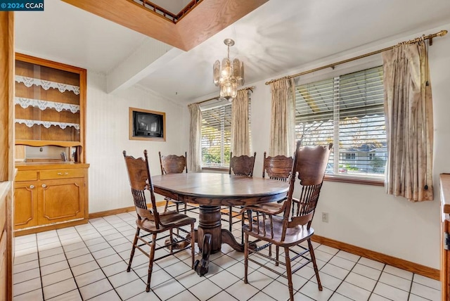 tiled dining area featuring lofted ceiling with beams and an inviting chandelier