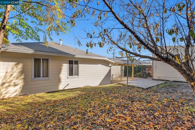 rear view of house with a patio