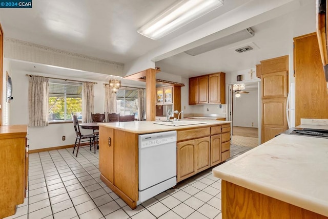 kitchen with dishwasher, sink, a center island with sink, light tile patterned flooring, and ceiling fan with notable chandelier