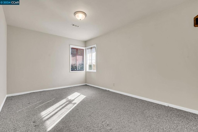 unfurnished room with carpet