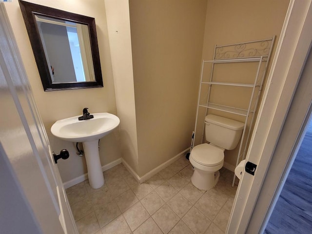 bathroom featuring toilet