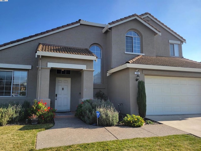 view of front of property featuring a garage