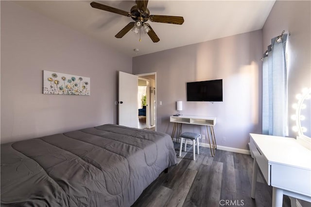 bedroom with ceiling fan and dark wood-type flooring