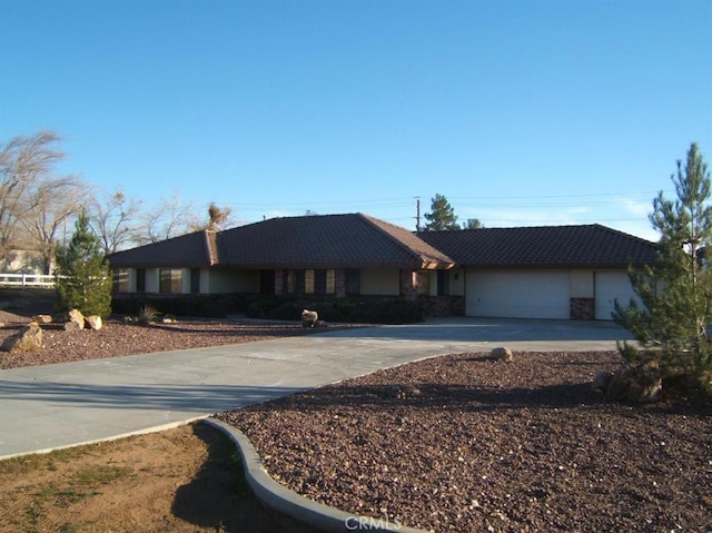 single story home with a garage