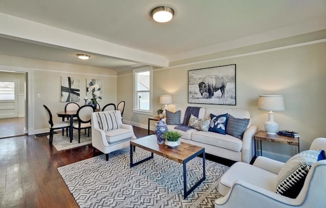 living room with dark hardwood / wood-style floors