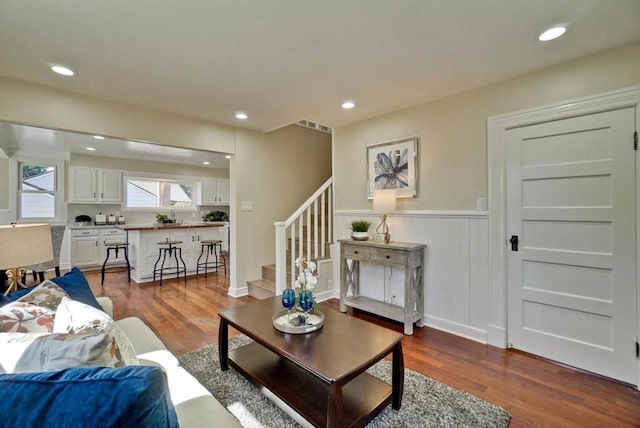 living room with dark wood-type flooring