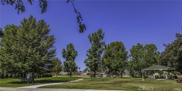 surrounding community featuring a yard and a gazebo