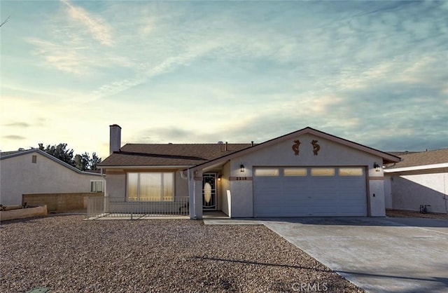 single story home featuring a garage