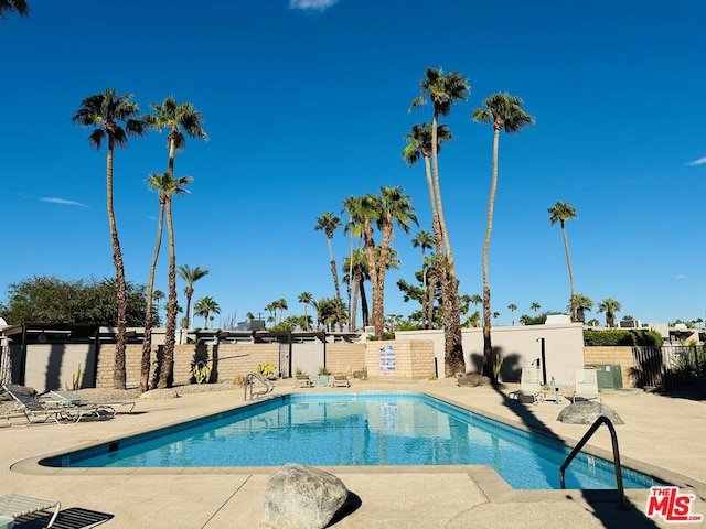 view of pool featuring a patio area