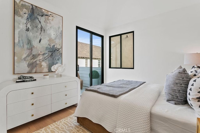 bedroom with wood finished floors