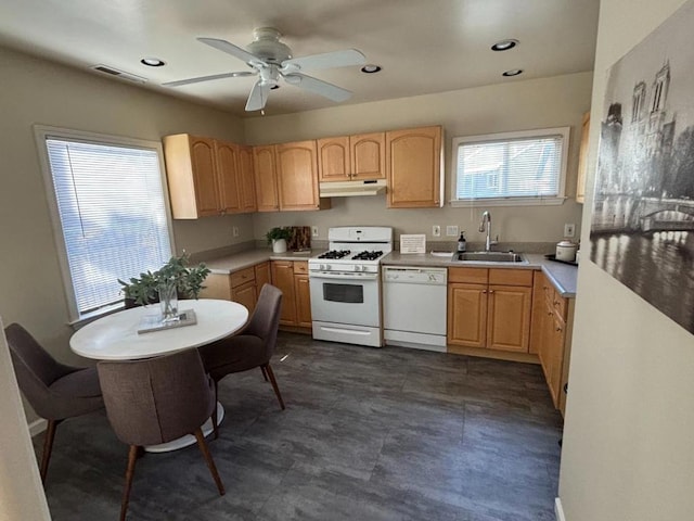 kitchen featuring ceiling fan, sink, white appliances, and light brown cabinets