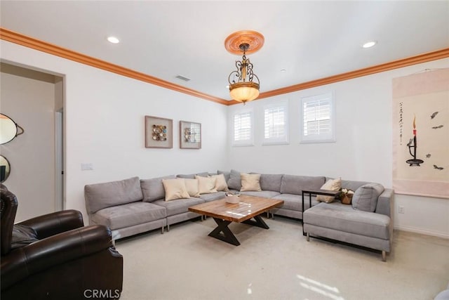 carpeted living room with ornamental molding