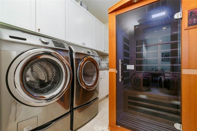 laundry room featuring beverage cooler and washing machine and clothes dryer