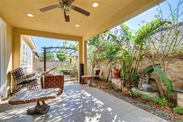 view of patio with ceiling fan