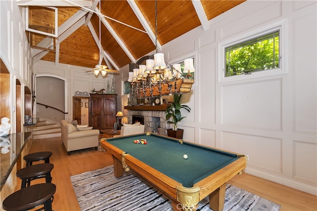 playroom with hardwood / wood-style flooring, pool table, high vaulted ceiling, and wood ceiling