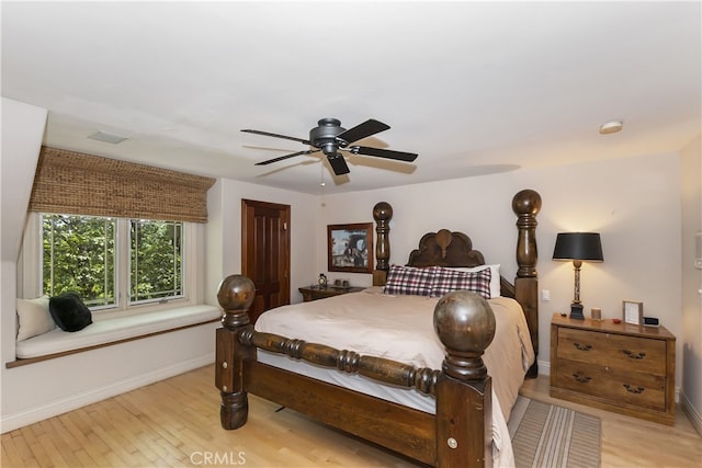 bedroom featuring ceiling fan and light hardwood / wood-style floors