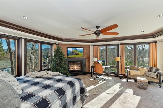 bedroom with ceiling fan, crown molding, carpet floors, and access to outside