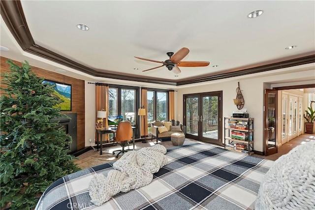 interior space featuring ceiling fan, crown molding, french doors, and access to outside