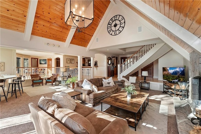 carpeted living room featuring high vaulted ceiling, wooden ceiling, beamed ceiling, and an inviting chandelier