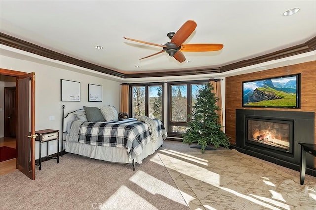 bedroom featuring light carpet, ceiling fan, and ornamental molding