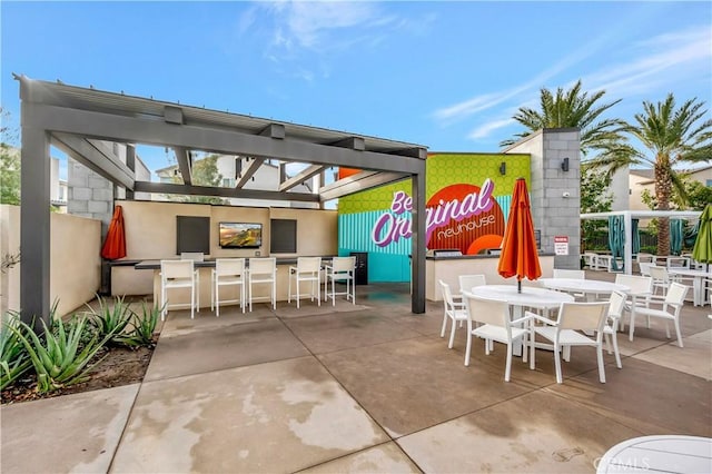 view of patio / terrace with a bar