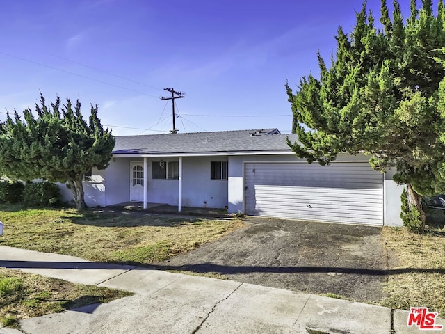 single story home with a garage