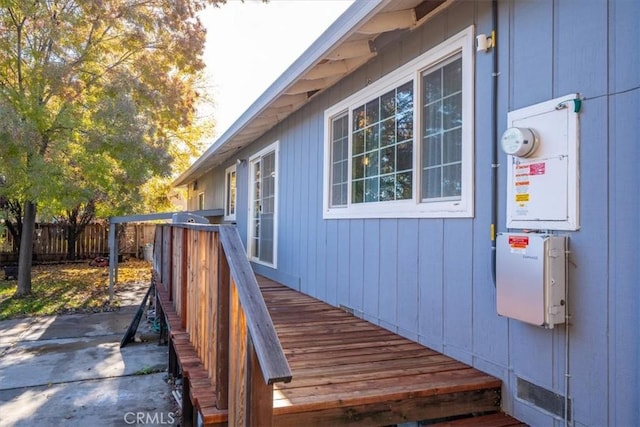 view of home's exterior featuring a wooden deck