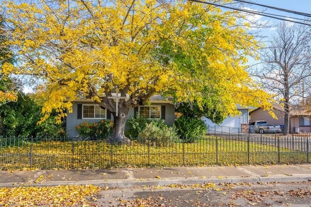 view of property hidden behind natural elements