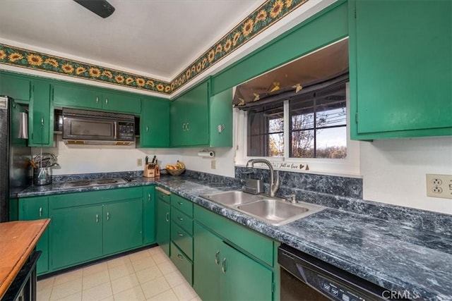 kitchen featuring sink, green cabinets, and black appliances