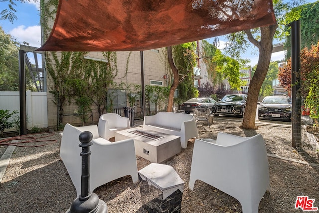 view of patio featuring a fire pit