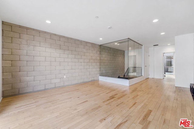 unfurnished room featuring light wood-type flooring