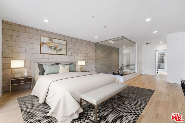 bedroom featuring light hardwood / wood-style flooring