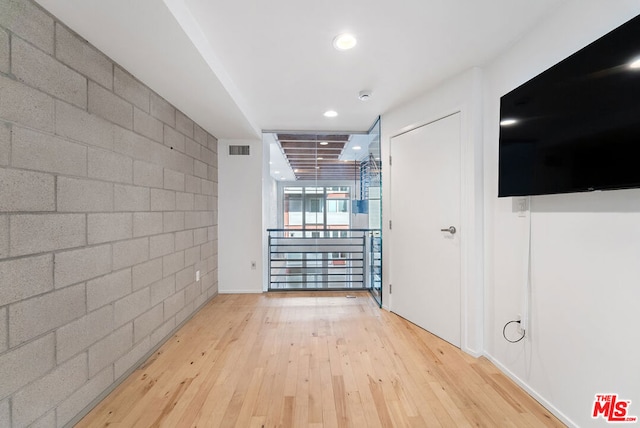 hall featuring light hardwood / wood-style floors