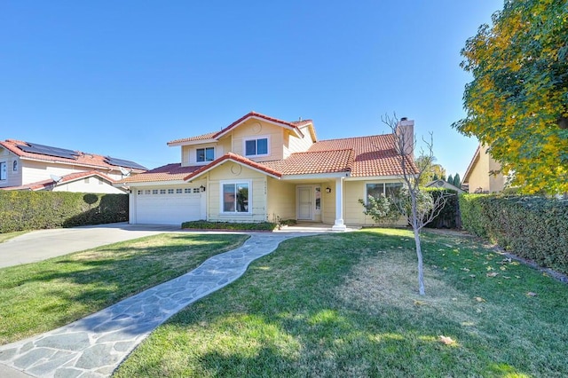 mediterranean / spanish-style house with a front lawn