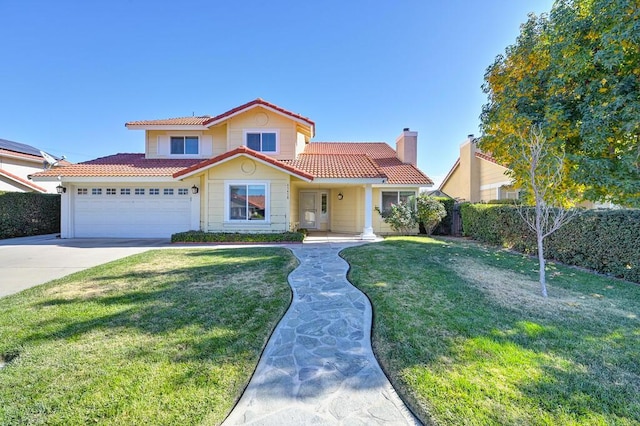 mediterranean / spanish home featuring a front lawn