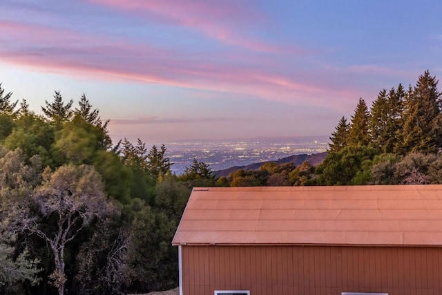 outdoor structure at dusk with a mountain view