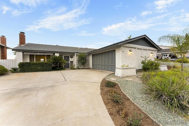 ranch-style house featuring a garage