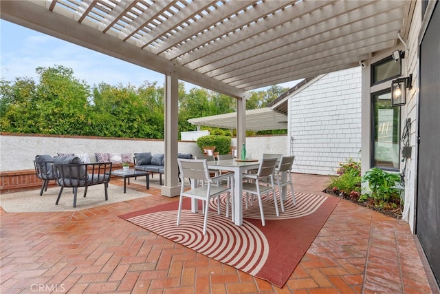 view of patio with an outdoor living space and a pergola