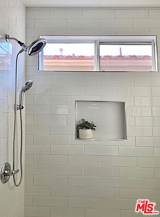 room details with a tile shower