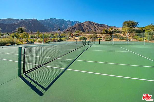 view of sport court with a mountain view