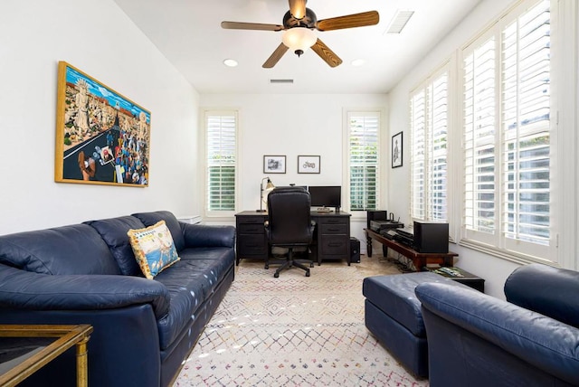 office area with ceiling fan and a healthy amount of sunlight