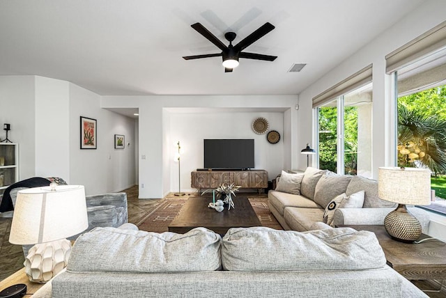 living room with ceiling fan