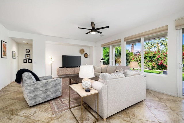 living room featuring ceiling fan