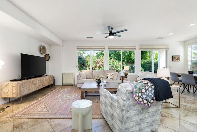 living room featuring ceiling fan