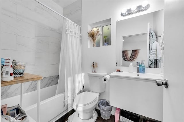 full bathroom with toilet, vanity, and shower / bath combination with curtain