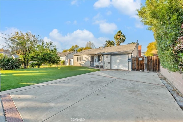 ranch-style home with a garage and a front yard